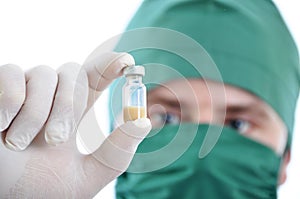 Doctor with drug in hand isolated