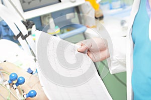 Doctor with an electrocardiogram photo