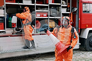 A doctor at an emergency ambulance service car goes to a patient with a suspected novel coronavirus COVID-19 infection