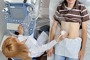 Doctor  examination a man at abdomen with ultrasonography device