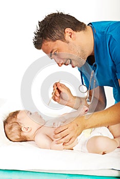 Doctor examine baby neck for sore throat