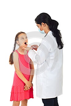 Doctor examine girl for sore throat