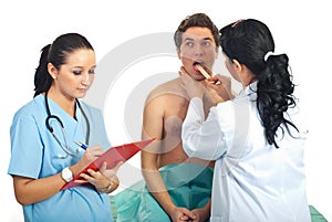 Doctor examine neck patient for sore throat