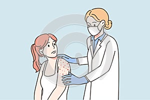 Doctor examine patient with red rash