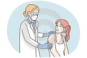 Doctor examine patient with red rash