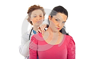 Doctor examine patient woman photo