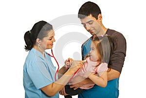 Doctor examine toddler girl photo