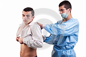 Doctor examine a young man patient with stethoscope