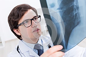 Doctor examining chest x-ray