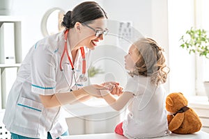 Doctor examining a child