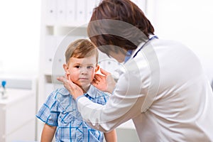 Doctor examining child