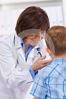 Doctor examining child