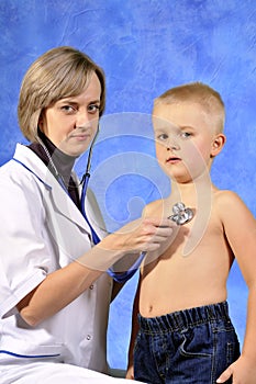 Doctor examining child