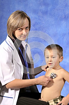 Doctor examining child