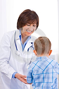 Doctor examining child