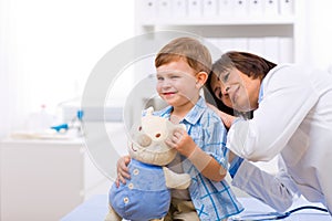 Doctor examining child