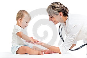Doctor examining child girl isolated on white