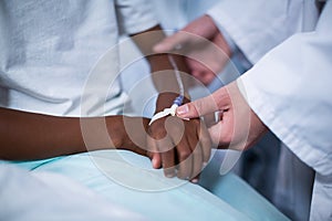 Doctor examining a child in hospital