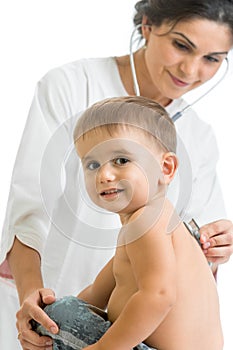 Doctor examining child isolated on white