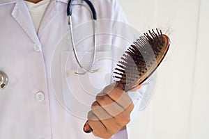 hair brush to prove hair loss. photo