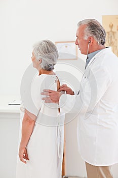 Doctor examining his patient