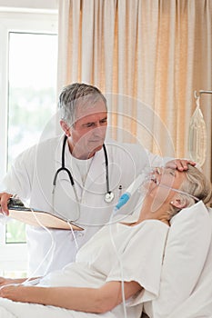 Doctor examining his patient