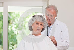 Doctor examining his patient