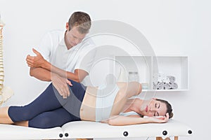 Doctor examining his patient pelvis