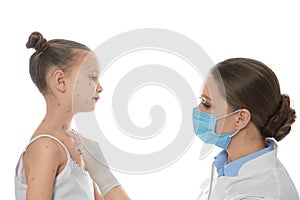 Doctor examining little girl with chickenpox on background. Varicella zoster virus