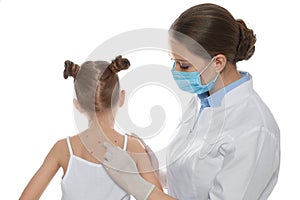 Doctor examining little girl with chickenpox on background. Varicella zoster virus