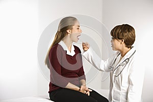 Doctor examining patient. photo