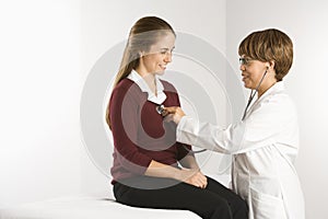 Doctor examining patient. photo