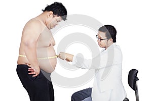 Doctor examining a patient obesity 2