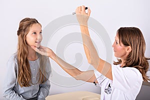 Doctor Examining Patient`s Eye photo