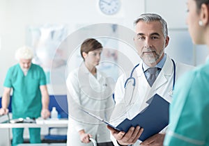 Doctor examining a patient`s medical records