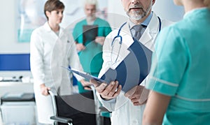 Doctor examining a patient`s medical records