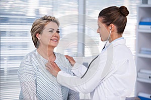 Doctor examining a patient with stethoscope