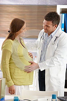 Doctor examining pregnant woman