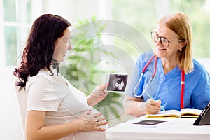 Doctor examining pregnant woman. Pregnancy check