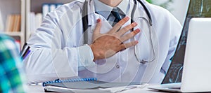 Doctor examining x-ray images of patient