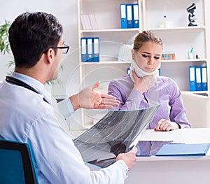 Doctor examining x-ray images of patient