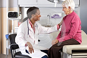 Doctor Examining Senior Female Patient