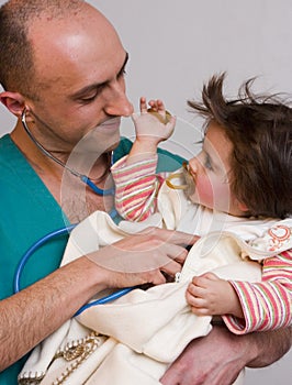 Doctor examining sick child