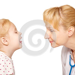 Doctor examining throat of the child