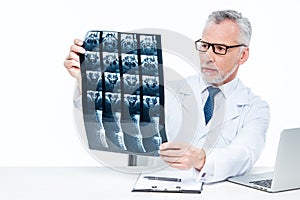 Doctor examining x-ray image