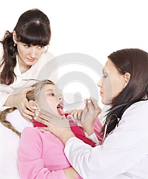 Doctor exams child with sore throat.