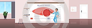 Doctor explaining anatomy of human muscles presentation healthcare muscle mass concept