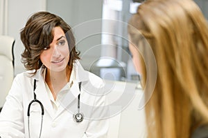 Doctor explaining diagnosis to her female patient