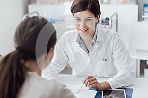 Doctor explaining diagnosis to the patient photo