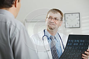 Doctor explaining to patient